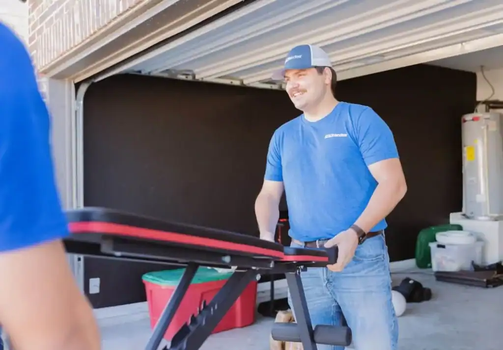 A1A mover moving exercise equipment out of a garage