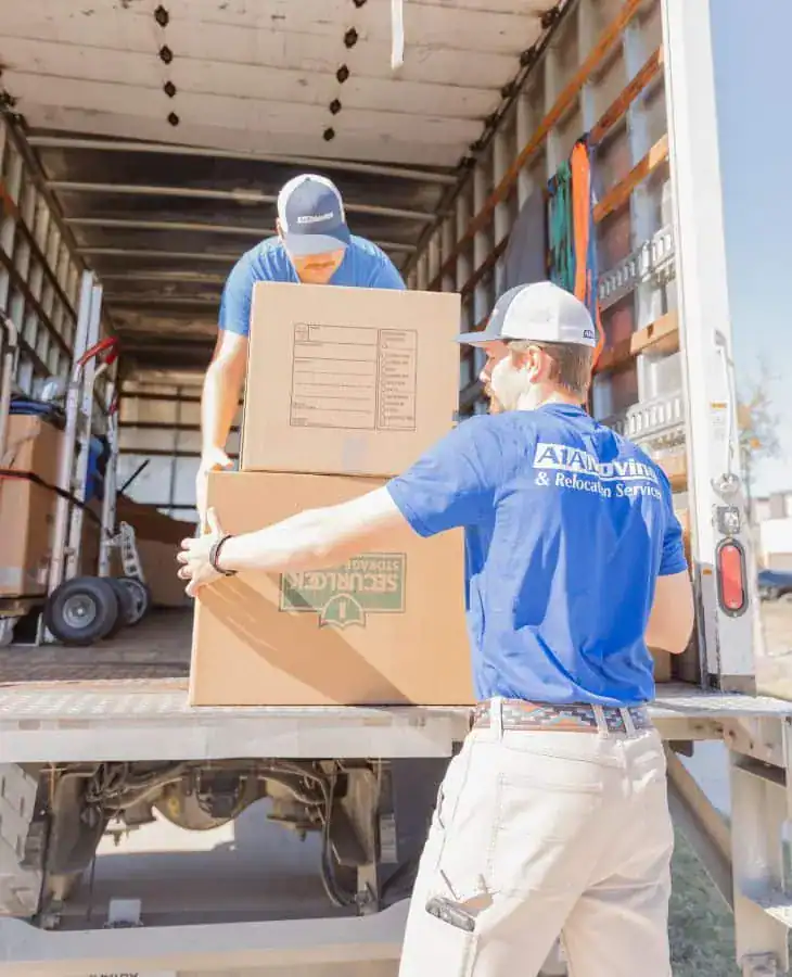 A1A movers loading boxes onto the moving truck
