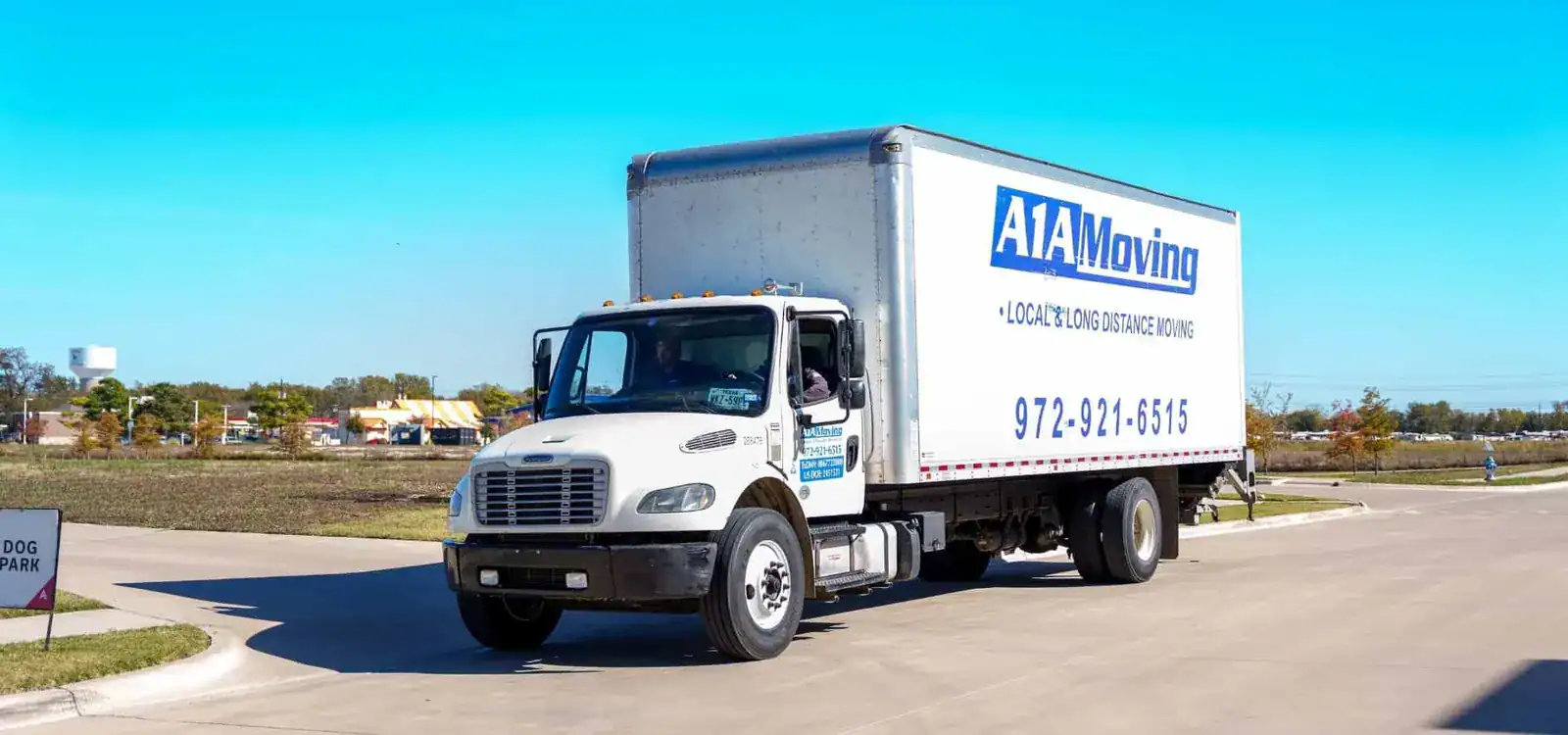A1A Moving box truck driving on a road