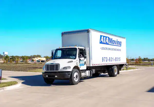 A1A Moving box truck parked on a residential street